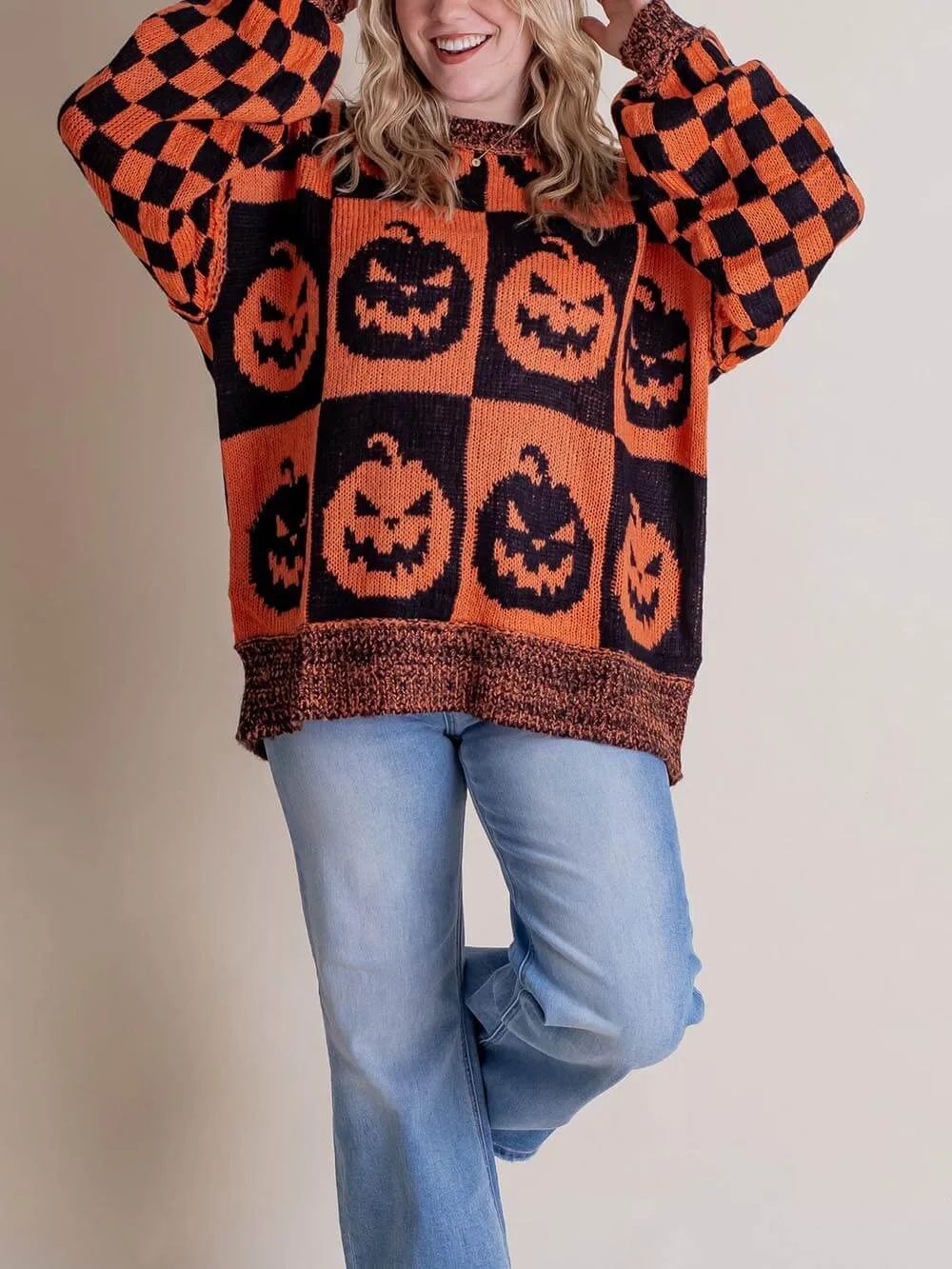 Pull à carreaux citrouille d'Halloween