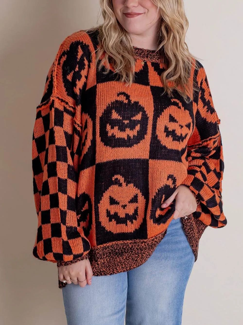 Pull à carreaux citrouille d'Halloween