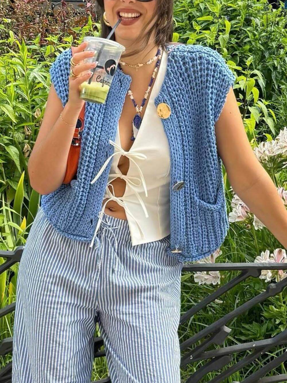 Gilet court en maille sans manches à poches élégantes
