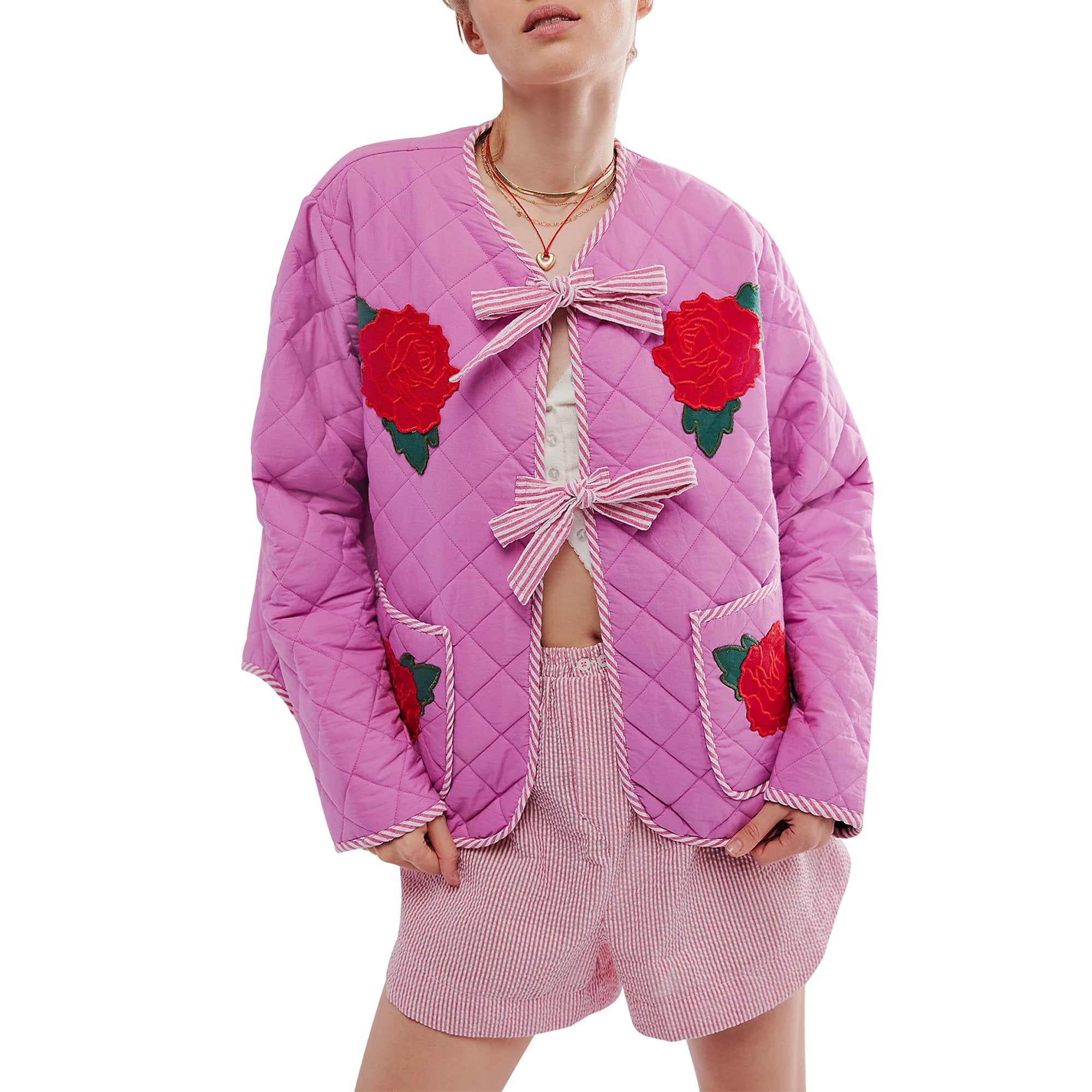 Veste fine rose à imprimé rose et nœud