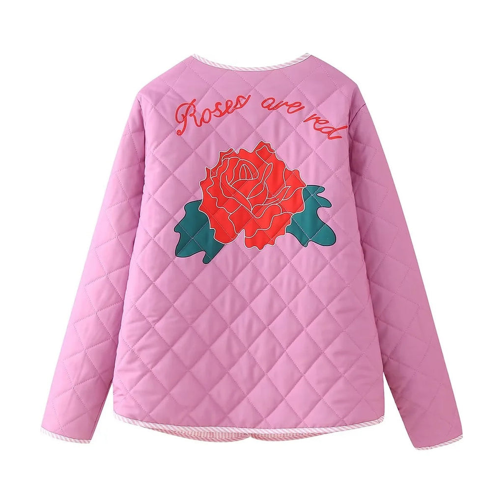 Veste fine rose à imprimé rose et nœud