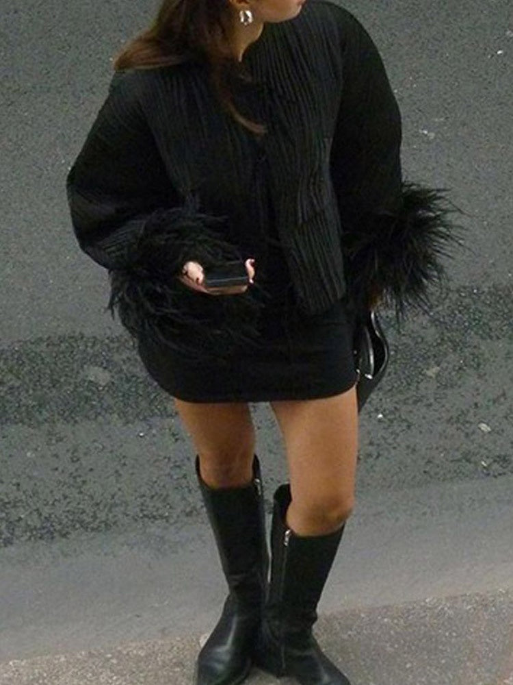 Veste à détails en plumes