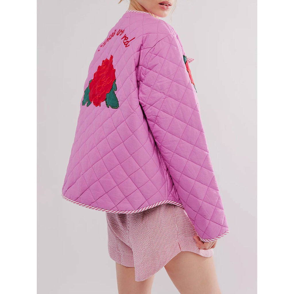 Veste fine rose à imprimé rose et nœud