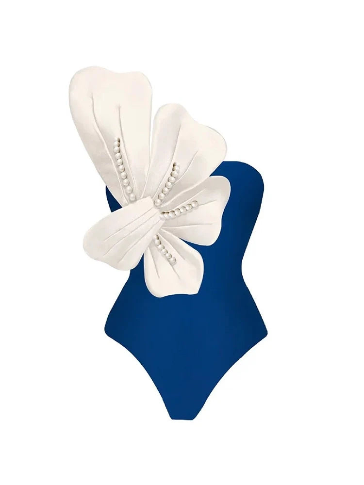 Ensemble maillot de bain bleu avec perles et détails floraux
